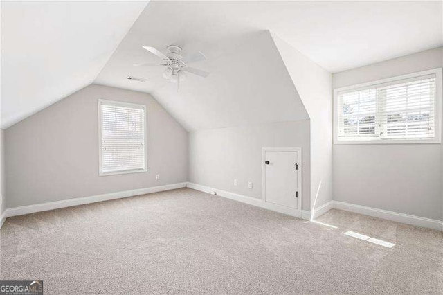 85 Stiles Dr, Dallas, GA 30132 - additional living space with carpet, lofted ceiling, and a ceiling fan