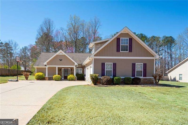85 Stiles Dr, Dallas, GA 30132 - craftsman-style house featuring driveway, a front yard, and a garage