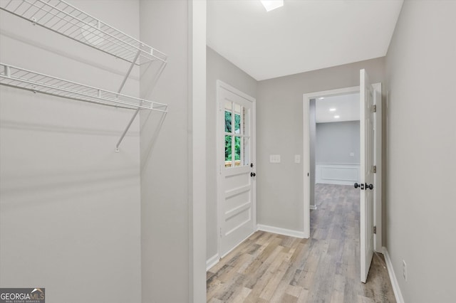 3290 Ebenezer Rd SE, Conyers, GA 30094 - walk in closet featuring light wood-style flooring