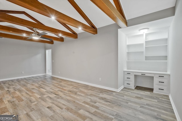 3290 Ebenezer Rd SE, Conyers, GA 30094 - unfurnished living room featuring ceiling fan, light wood-style floors, and baseboards