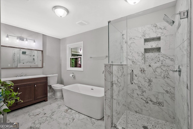 3290 Ebenezer Rd SE, Conyers, GA 30094 - bathroom featuring a stall shower, vanity, a freestanding tub, marble finish flooring, and toilet