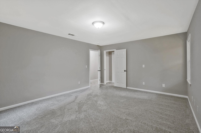 3290 Ebenezer Rd SE, Conyers, GA 30094 - carpeted spare room featuring baseboards