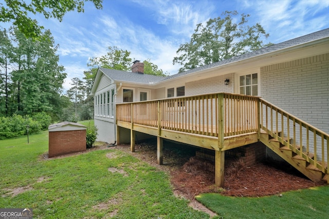 3290 Ebenezer Rd SE, Conyers, GA 30094 - back of property with brick siding, a yard, a deck, and a chimney