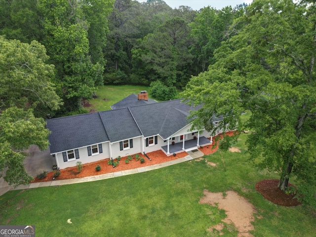 3290 Ebenezer Rd SE, Conyers, GA 30094 - view from above of property with a forest