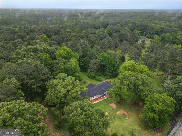 3290 Ebenezer Rd SE, Conyers, GA 30094 - aerial view of property and surrounding area with a forest