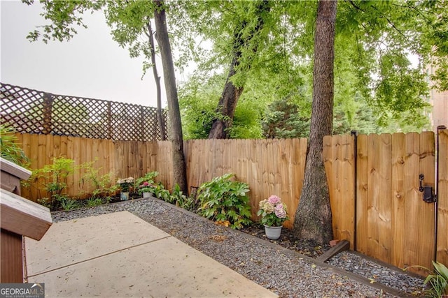 151 Savannah St SE, Atlanta, GA 30316 - fenced backyard featuring a patio area