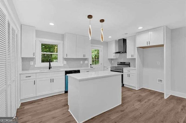 2326 Brackett St SW, Marietta, GA 30060 - kitchen with dishwasher, wall chimney exhaust hood, stainless steel electric range, a sink, and white cabinets