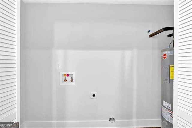 2326 Brackett St SW, Marietta, GA 30060 - laundry area with hookup for a washing machine, water heater, hookup for an electric dryer, and baseboards