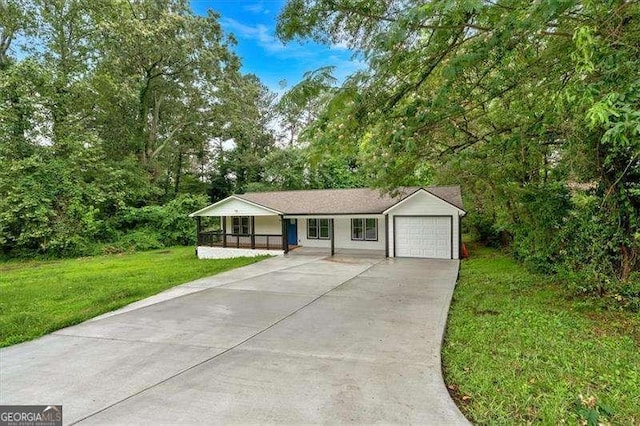2326 Brackett St SW, Marietta, GA 30060 - ranch-style home featuring concrete driveway, a front lawn, a porch, and a garage