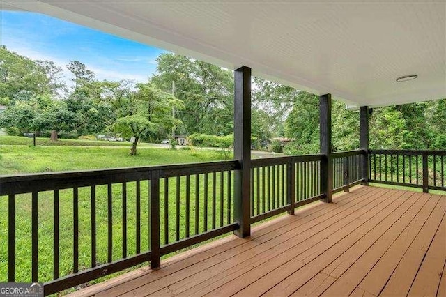 2326 Brackett St SW, Marietta, GA 30060 - wooden deck featuring a lawn and view of wooded area