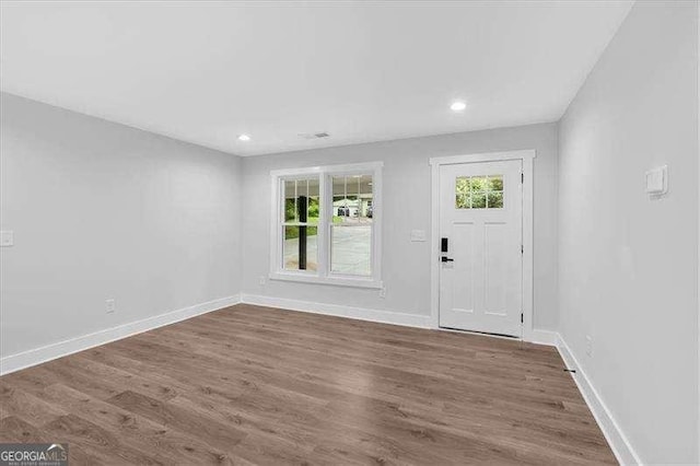 2326 Brackett St SW, Marietta, GA 30060 - foyer featuring baseboards, wood finished floors, and recessed lighting