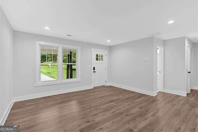2326 Brackett St SW, Marietta, GA 30060 - entryway featuring baseboards, wood finished floors, and recessed lighting