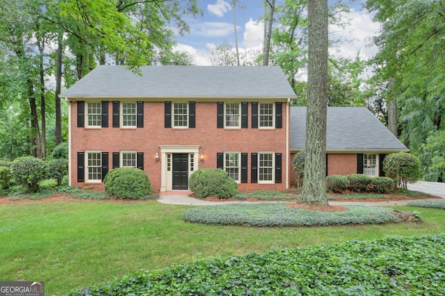 3564 Liberty Ln, Marietta, GA 30062 - colonial-style house with a front lawn and brick siding
