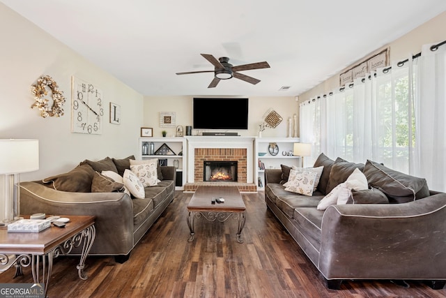 75 Hunters Ct, Dallas, GA 30157 - living room with ceiling fan, a brick fireplace, and dark wood-style flooring