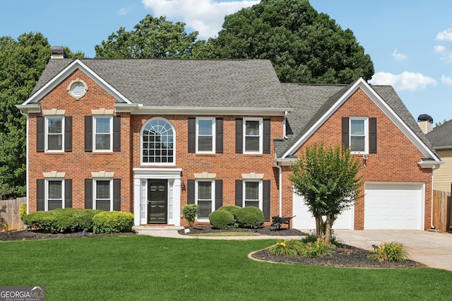 75 Hunters Ct, Dallas, GA 30157 - colonial inspired home featuring brick siding, driveway, a chimney, a garage, and roof with shingles