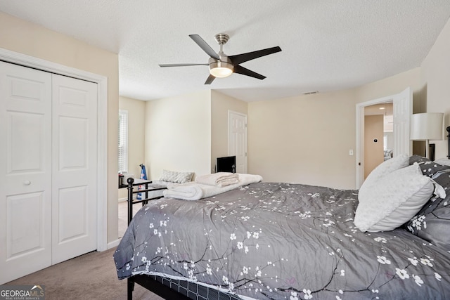 75 Hunters Ct, Dallas, GA 30157 - carpeted bedroom featuring a closet, a textured ceiling, and ceiling fan