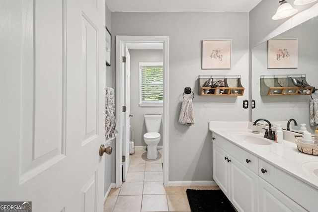 75 Hunters Ct, Dallas, GA 30157 - full bathroom with toilet, double vanity, tile patterned flooring, and baseboards