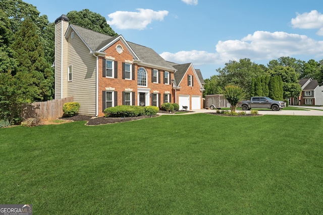 75 Hunters Ct, Dallas, GA 30157 - view of front facade with driveway, brick siding, a chimney, and a garage
