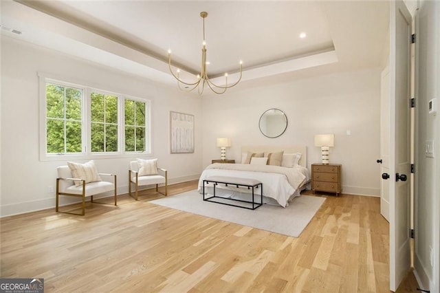 4757 Lake Forrest Dr NW, Atlanta, GA 30342 - bedroom with light wood-style floors, a chandelier, a raised ceiling, baseboards, and recessed lighting