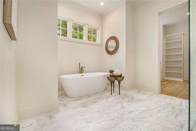 4757 Lake Forrest Dr NW, Atlanta, GA 30342 - bathroom with marble finish floors, a soaking tub, baseboards, and recessed lighting