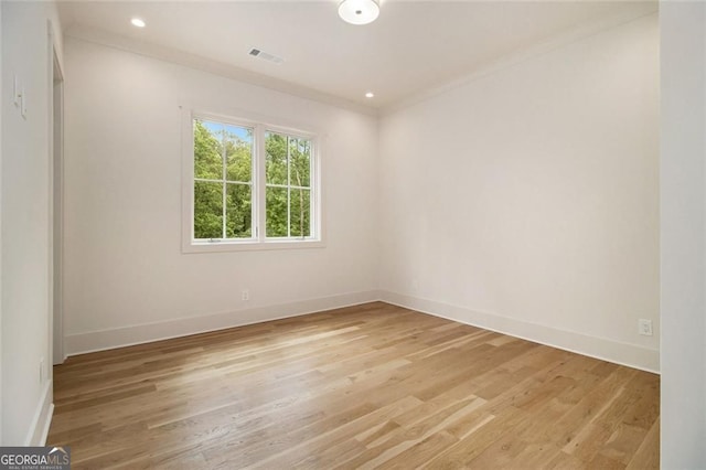 4757 Lake Forrest Dr NW, Atlanta, GA 30342 - empty room featuring baseboards, light wood-style floors, ornamental molding, and recessed lighting