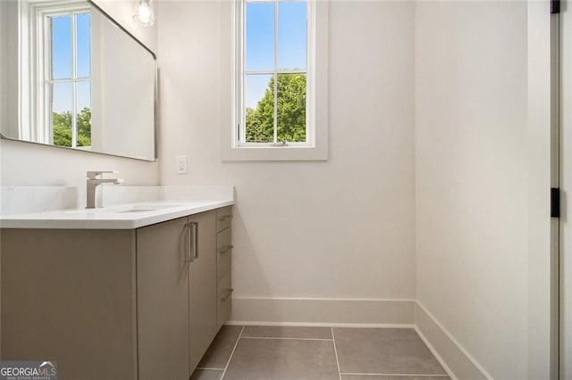 4757 Lake Forrest Dr NW, Atlanta, GA 30342 - bathroom featuring vanity, baseboards, and tile patterned floors