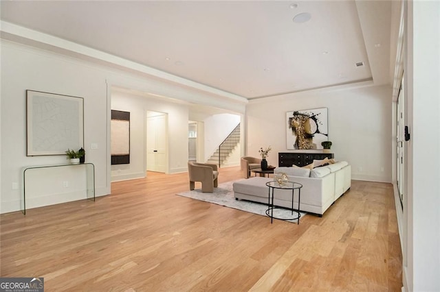 4757 Lake Forrest Dr NW, Atlanta, GA 30342 - living room with light wood finished floors, baseboards, and stairway