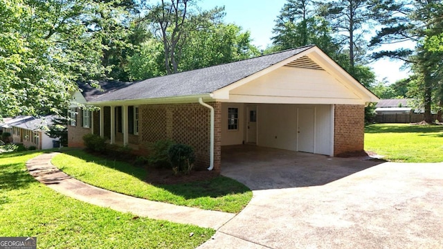 120 Watson Dr, Athens, GA 30605 - ranch-style home with concrete driveway, brick siding, and an attached carport