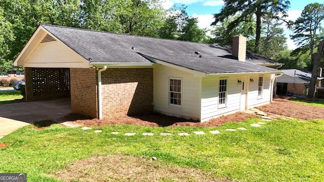 120 Watson Dr, Athens, GA 30605 - view of side of home featuring a chimney, driveway, a shingled roof, a lawn, and brick siding