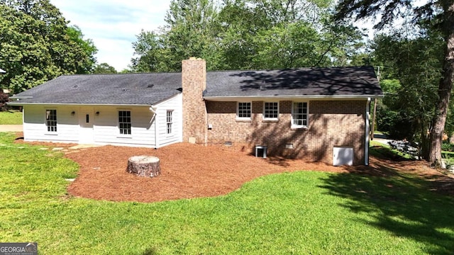 120 Watson Dr, Athens, GA 30605 - back of house featuring crawl space, a chimney, a yard, central AC unit, and brick siding