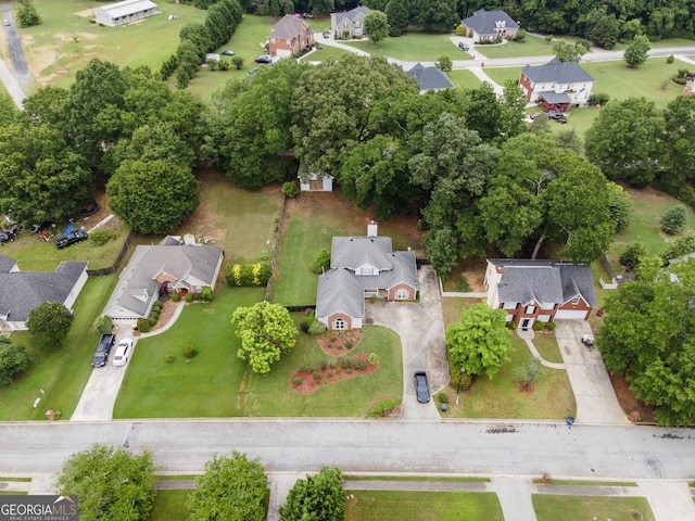 2881 Bridle Creek Dr SW, Conyers, GA 30094 - aerial view of residential area featuring a tree filled landscape
