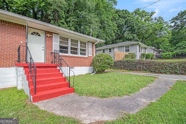 2329 Polar Rock Ave SW, Atlanta, GA 30315 - view of front facade with crawl space and brick siding