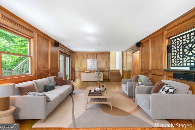 2717 Hearthstone Cir, Marietta, GA 30062 - living area with wood walls and light wood-style floors
