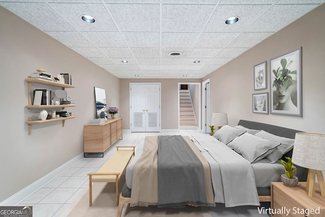 2717 Hearthstone Cir, Marietta, GA 30062 - bedroom featuring two closets, recessed lighting, and tile patterned floors