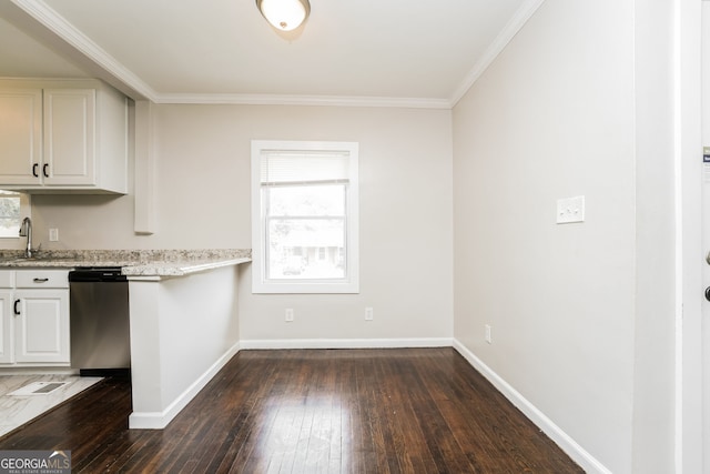 1381 Benteen Way SE, Atlanta, GA 30315 - kitchen with dishwasher, dark wood-style floors, plenty of natural light, crown molding, and white cabinets