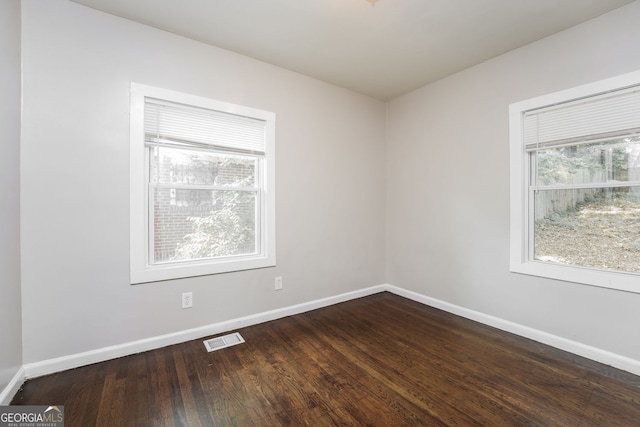 1381 Benteen Way SE, Atlanta, GA 30315 - spare room with plenty of natural light and dark wood finished floors