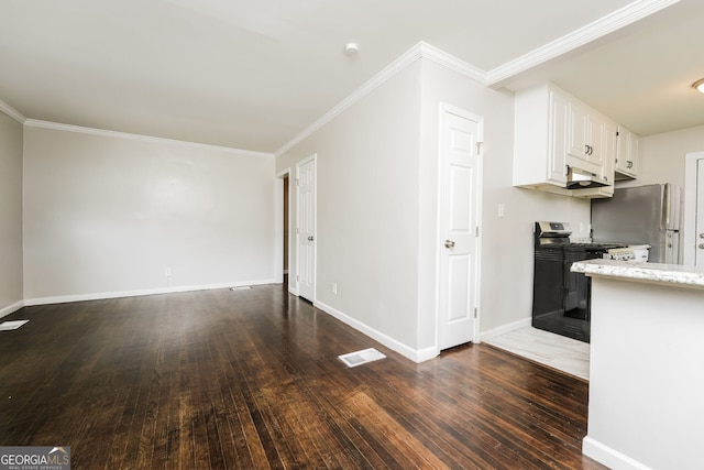 1381 Benteen Way SE, Atlanta, GA 30315 - kitchen with stainless steel gas stove, hardwood / wood-style floors, white cabinets, under cabinet range hood, and ornamental molding