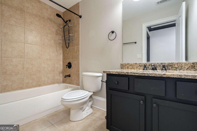 2767 Durham Dr NE, Atlanta, GA 30319 - bathroom featuring toilet, vanity, tile patterned floors,  shower combination, and baseboards