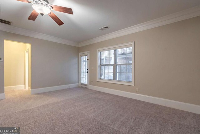 2767 Durham Dr NE, Atlanta, GA 30319 - empty room with ornamental molding, carpet flooring, and ceiling fan