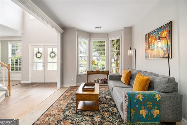 525 Arbor Creek Ct, Roswell, GA 30076 - living room featuring wood finished floors, stairs, and baseboards