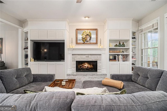 525 Arbor Creek Ct, Roswell, GA 30076 - living area featuring a fireplace, crown molding, and built in shelves