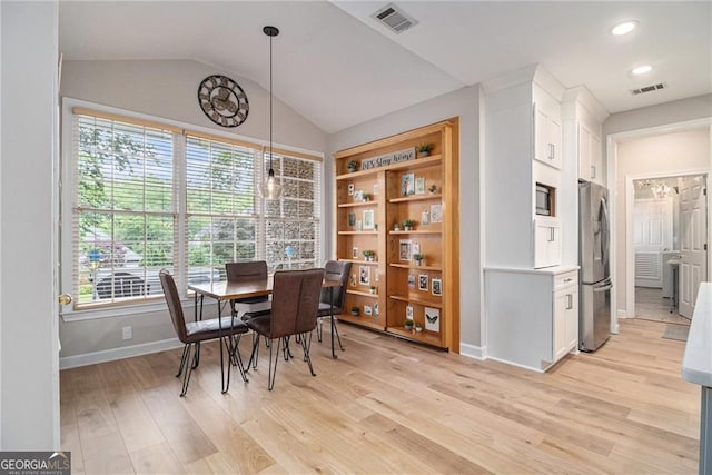 525 Arbor Creek Ct, Roswell, GA 30076 - dining space with healthy amount of natural light, baseboards, light wood-style floors, lofted ceiling, and recessed lighting
