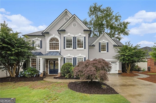 525 Arbor Creek Ct, Roswell, GA 30076 - view of front of property featuring french doors, a garage, concrete driveway, stucco siding, and a front yard
