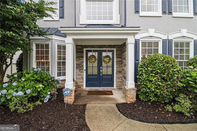 525 Arbor Creek Ct, Roswell, GA 30076 - doorway to property featuring stone siding, stucco siding, and french doors