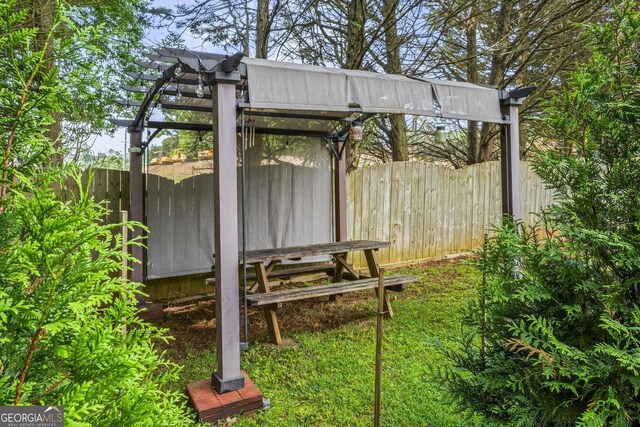 4365 Wicklow Ct, Suwanee, GA 30024 - view of yard featuring a pergola