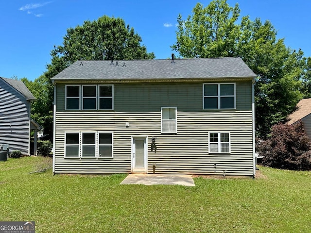 234 Silver Arrow Cir, Austell, GA 30168 - rear view of house featuring a lawn, a patio, and central AC