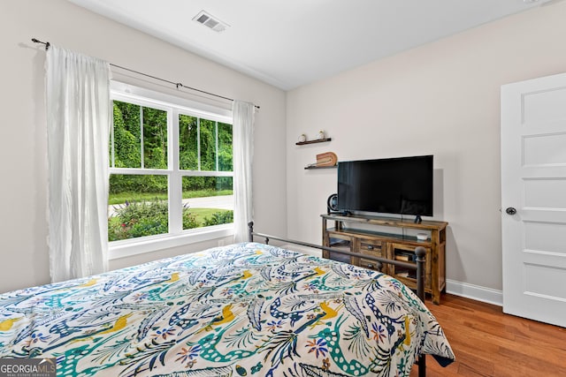 19 E Murphy St, Newnan, GA 30263 - bedroom featuring wood finished floors and baseboards