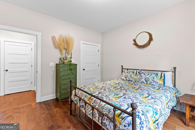 19 E Murphy St, Newnan, GA 30263 - bedroom with wood finished floors and baseboards