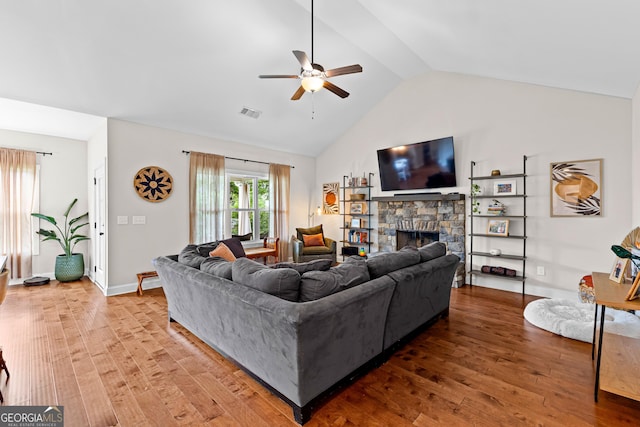 19 E Murphy St, Newnan, GA 30263 - living area featuring a ceiling fan, light wood-type flooring, a fireplace, high vaulted ceiling, and baseboards