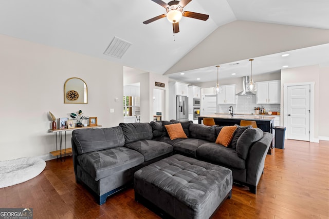 19 E Murphy St, Newnan, GA 30263 - living area with a ceiling fan, vaulted ceiling, dark wood finished floors, and recessed lighting